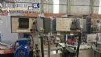 Etiquetadora automtica de doble cabezal para botellas planas Bauch Campos