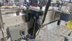 Etiquetadora autom�tica de doble cabezal para botellas planas Bauch Campos