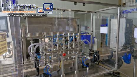 L�nea de llenado completa con m�quinas Tecman Nelpas Tecnoenvase Tudela para el llenado, etiquetado, taponado y posicionamiento de botellas de l�quidos cosm�ticos.