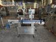 L�nea de llenado completa con m�quinas Tecman Nelpas Tecnoenvase Tudela para el llenado, etiquetado, taponado y posicionamiento de botellas de l�quidos cosm�ticos.