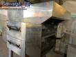 Horno transportador Lincoln de acero inoxidable para hornear galletas y pizza.