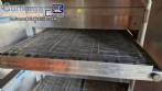 Horno transportador Lincoln de acero inoxidable para hornear galletas y pizza.