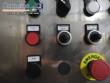 Llenadora rotativa gravimtrica de acero inoxidable con cabina