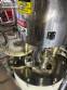 Llenadora rotativa gravim�trica de acero inoxidable con cabina