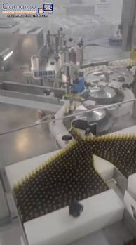 Labeling machine for injectable drop vials 24,000 vials per hour Bausch year 2026