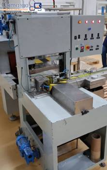 Empacadora Euromax para la formaci�n de pacas de productos.