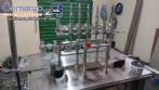 Llenadora lineal con sistema de llenado de 6 pistones