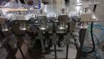 Llenadora lineal con sistema de llenado de 6 pistones