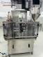 Llenadora dosificadora volum�trica con selladora y taponadora en acero inoxidable Delgo 2000 botes por hora
