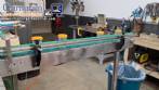 M�quina rotativa de llenado y dosificaci�n con unidad de taponado y sellado para vasos y botellas, con capacidad para 2.000 unidades.
